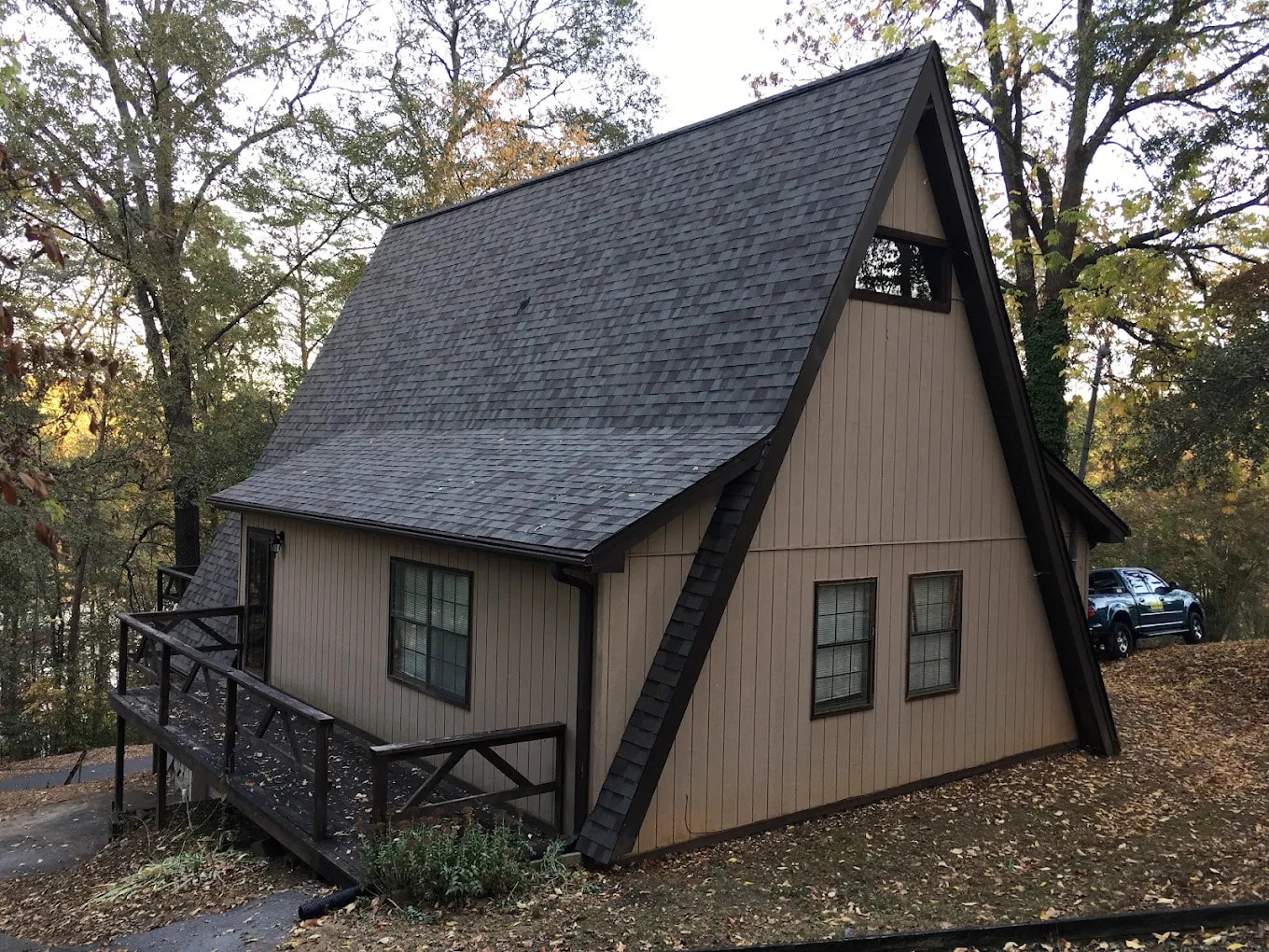 building with a steep shingle roof