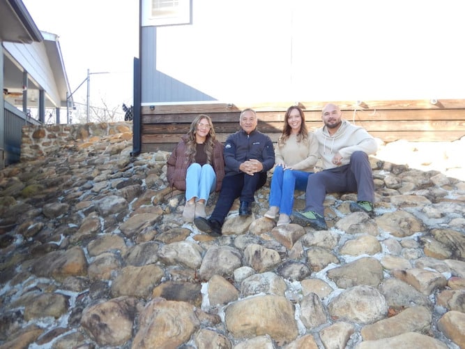 roofing company owner and family